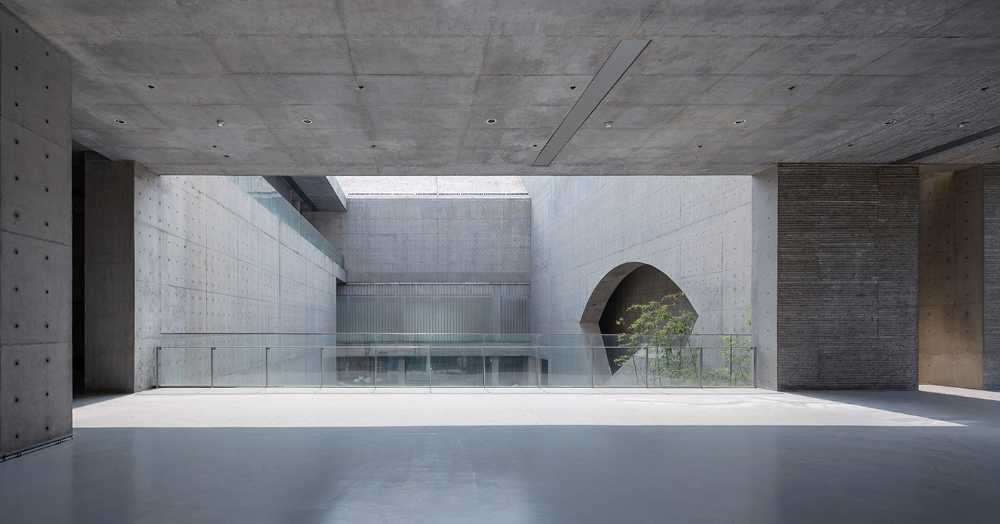 cultural center structure concrete lake entrance