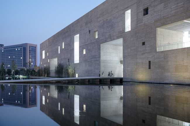 cultural center structure concrete lake entrance