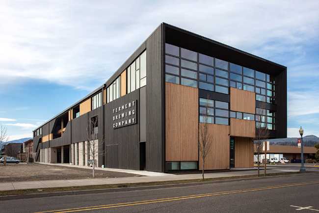 Building covered in charred wood