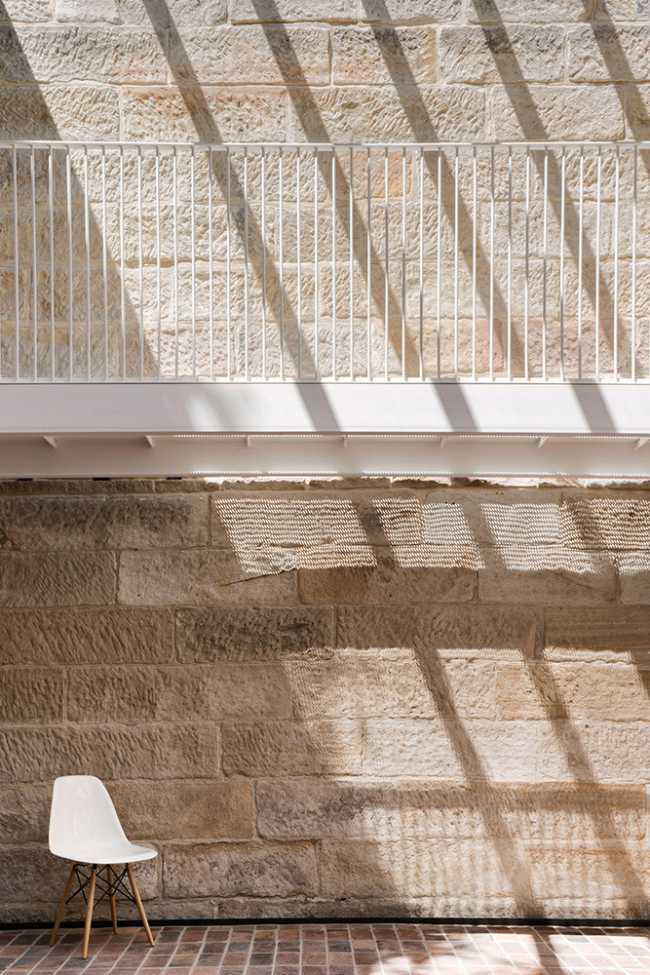 Brick wall and metal balustrade