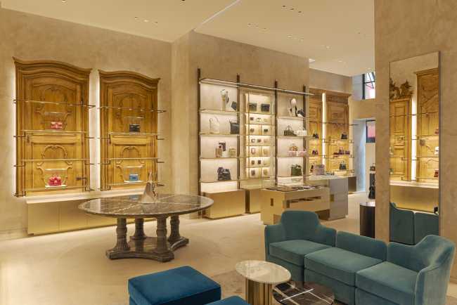 Exhibitors created with old doors Delvaux Paris store and historical table