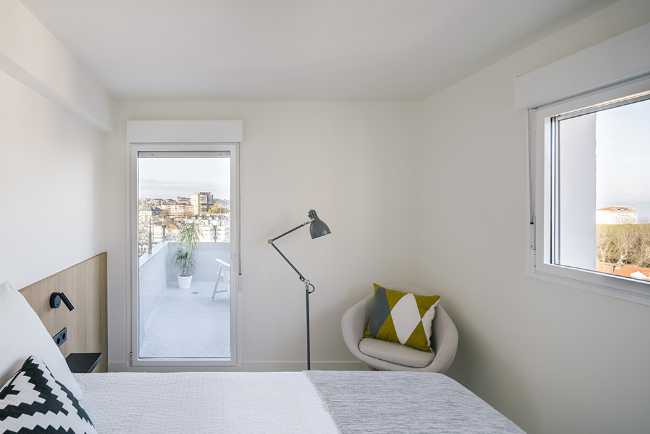 Renovated apartment in Spain. The new layout takes advantage of the views of the place