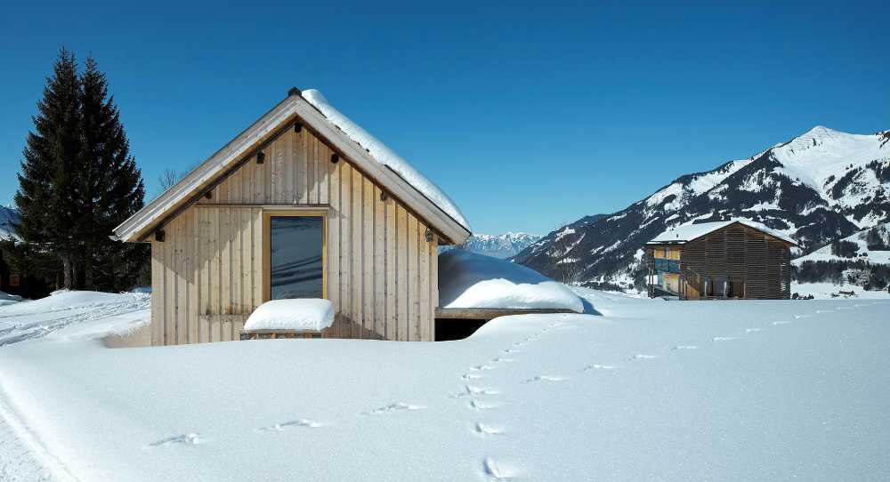 Küng House in the Austrian mountains. Knitted wooden walls